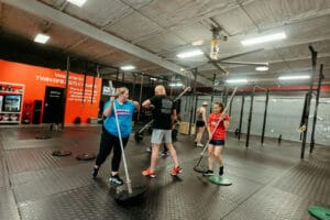 CrossFit athletes participating in a CrossFit workout