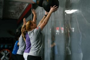 CrossFit athletes participate in a CrossFit workout.