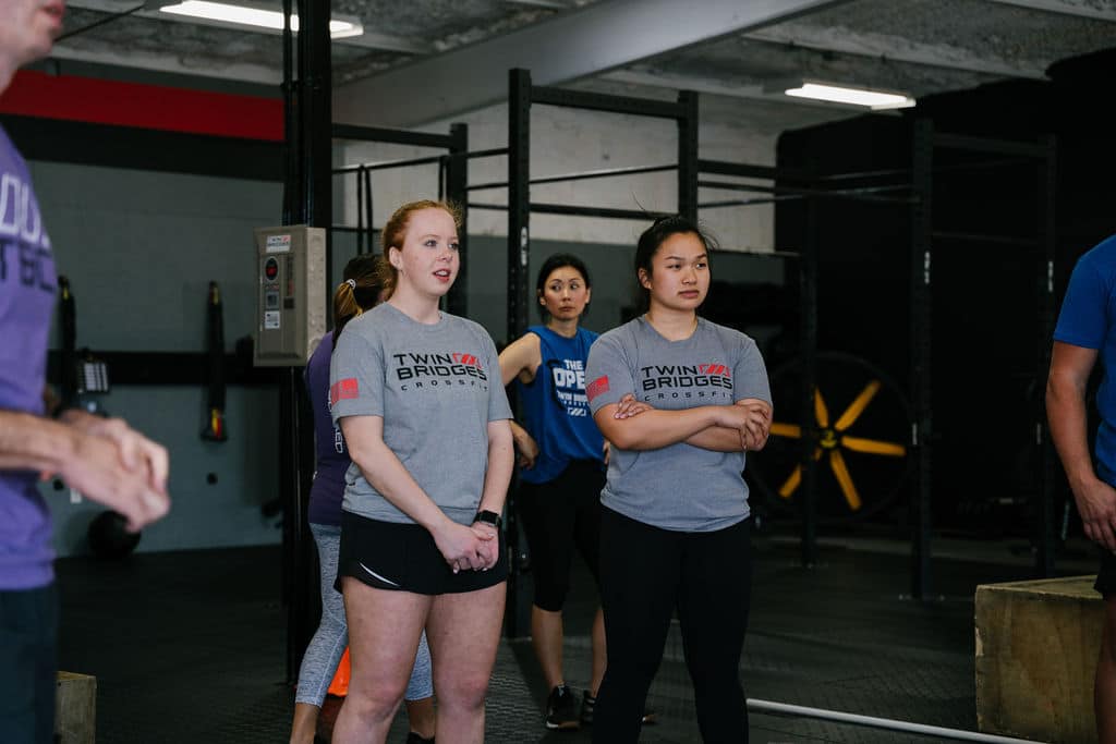 CrossFit athletes prepare for a CrossFit workout