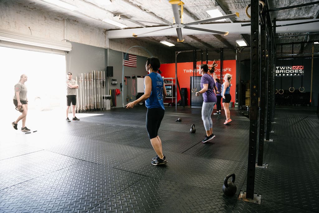 CrossFit athletes participate in a CrossFit workout