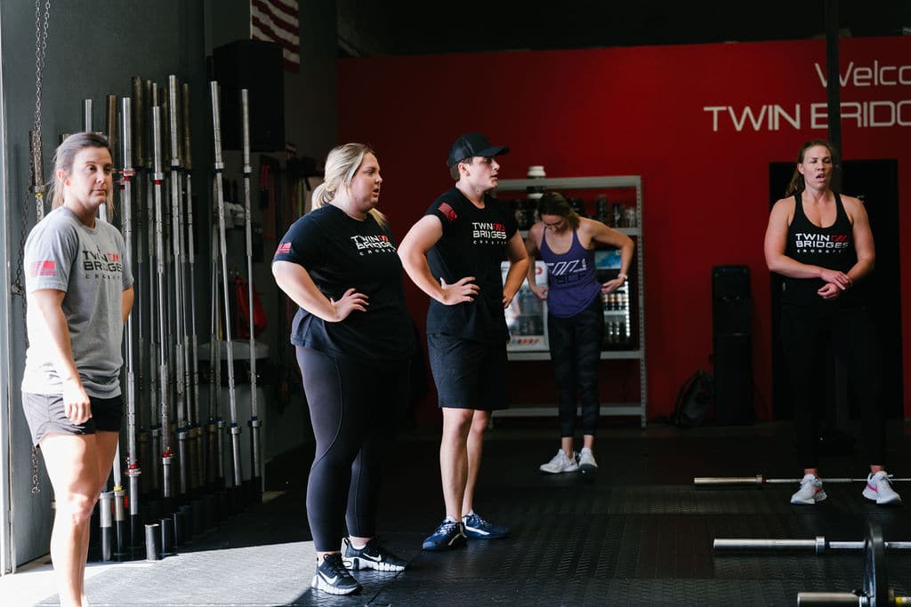 CrossFit athletes prepare to participate in a CrossFit workout