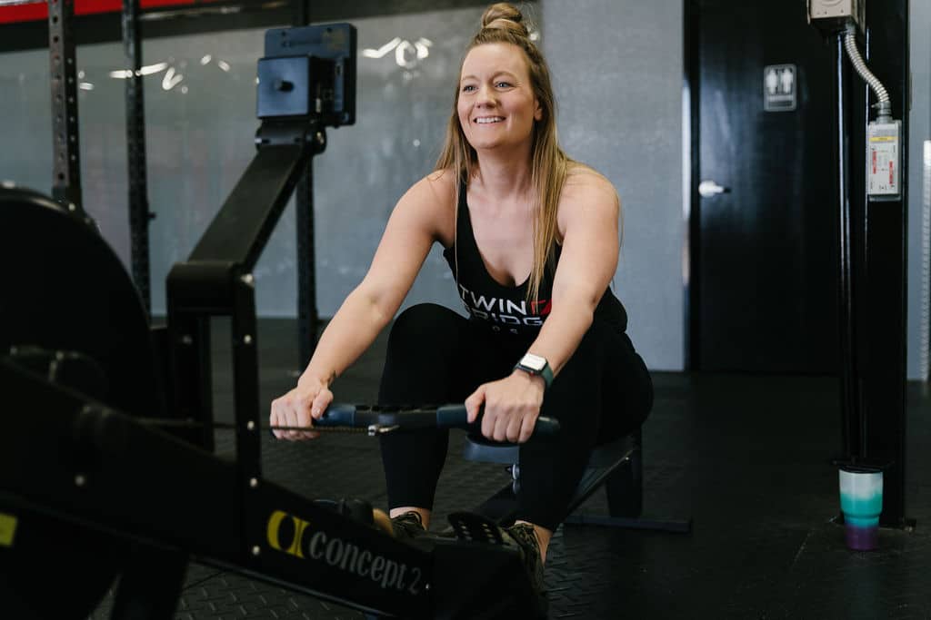 A CrossFit athlete uses the Concept2 row erg