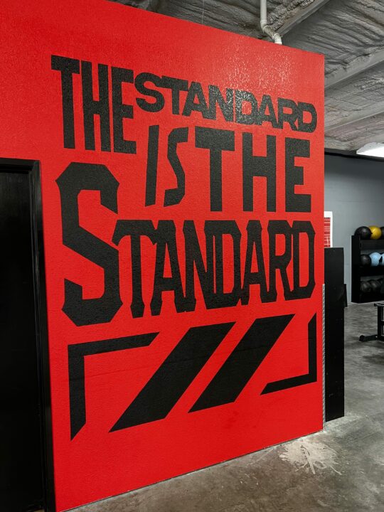 The Standard is the Standard in big black letters on a big red wall.